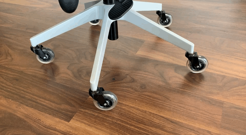 Office chair with silicone rollerblade wheels moving around